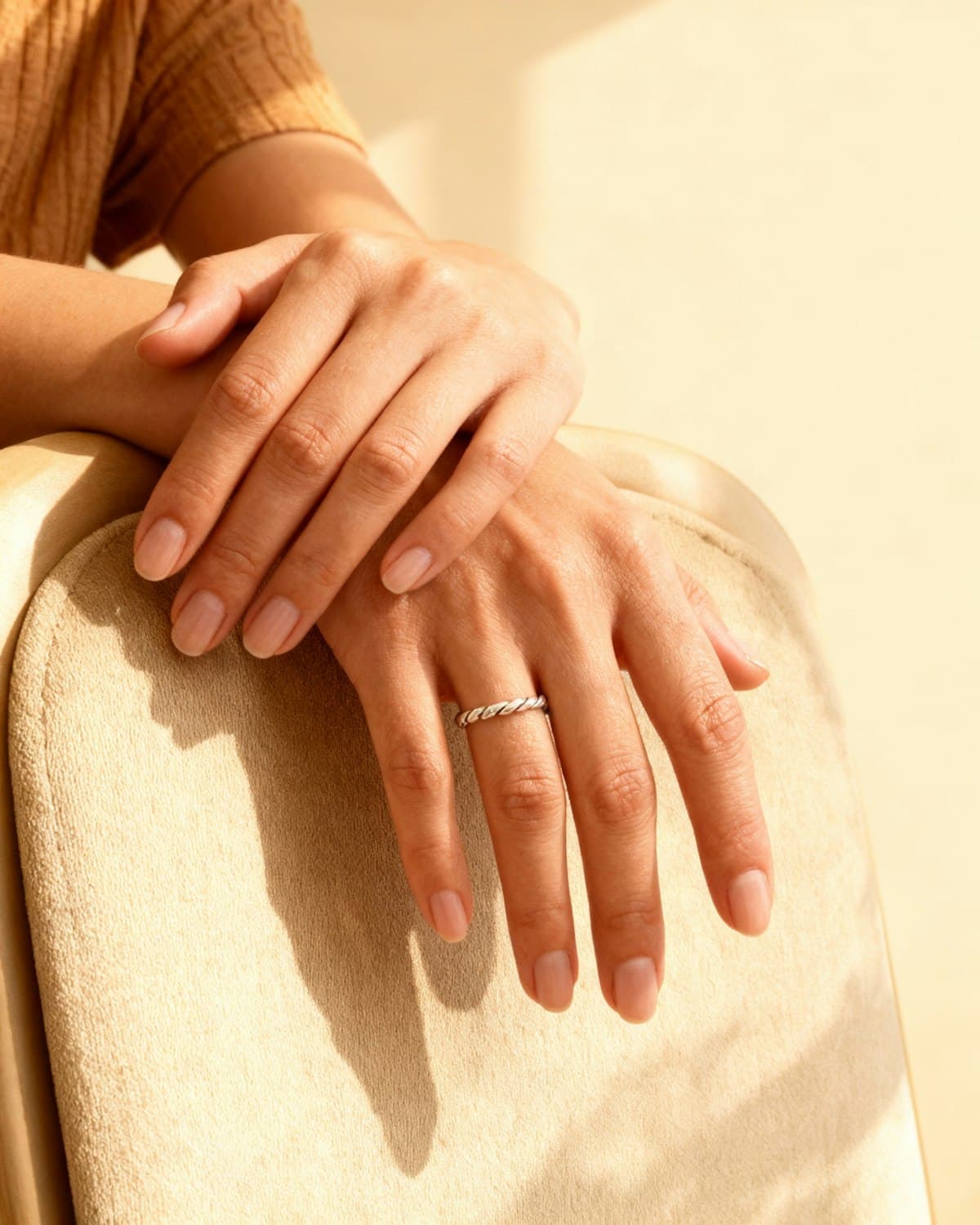 Close up of hands in warm light